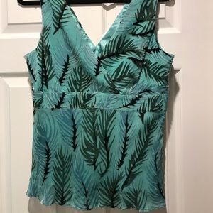 Gorgeous Macy’s INC tank in various green colors.